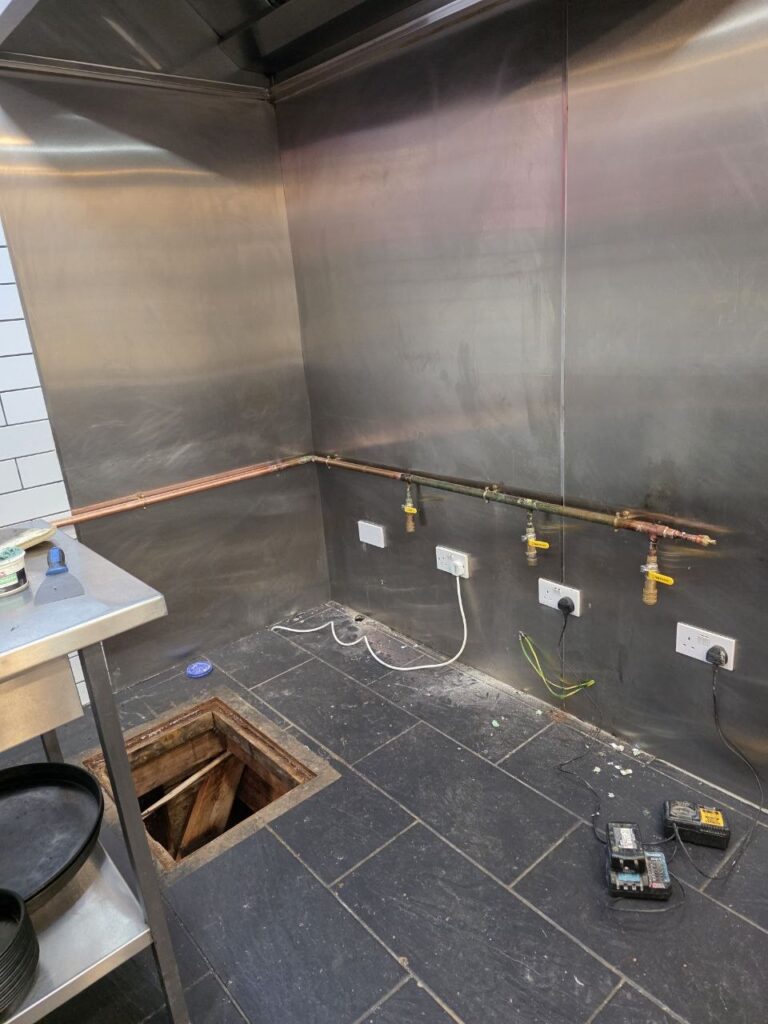 Completed gas pipework installation in commercial kitchen