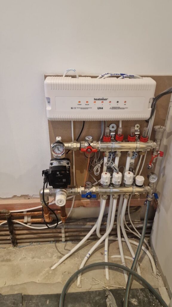 Heatmiser manifold and multi-zone heating control system