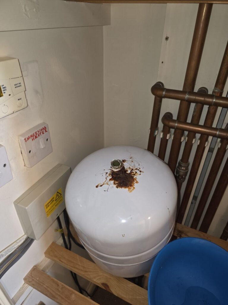 Corroded hot water cylinder valve before leak repair