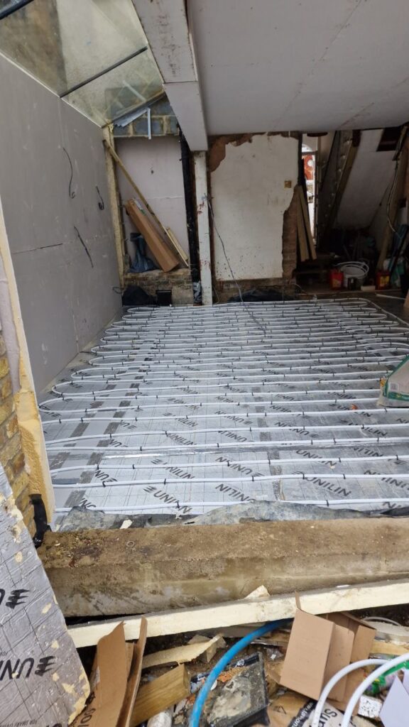 Subfloor insulation boards ready for underfloor heating installation